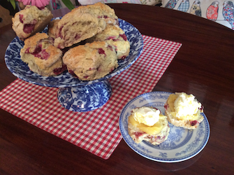 An Image of Our Delicious Raspberry Scones with Lemon Curd and Clotted Cream